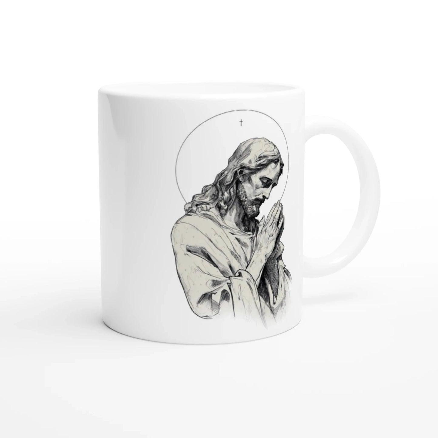 Mug en céramique blanche avec un dessin en noir et blanc représentant jésus les mains jointes