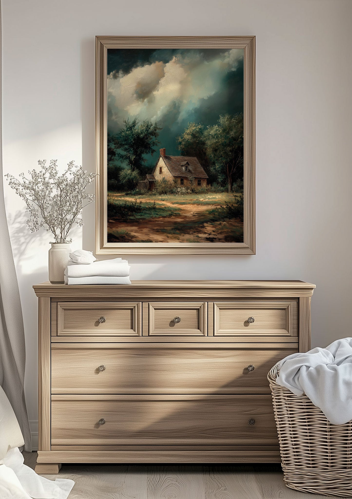 Mise en situation au dessus d'une commode d'une affiche automne représentant un cottage