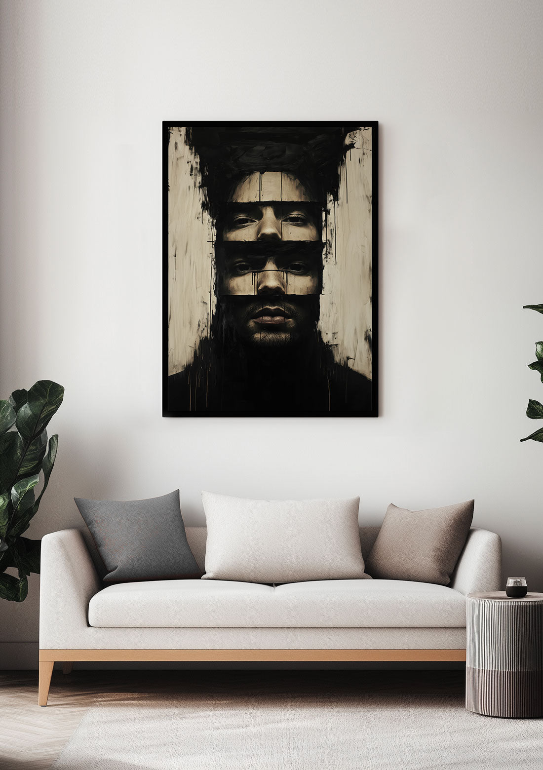Affiche murale peinture homme aux deux visage, encadrée, sur le mur d'un salon.