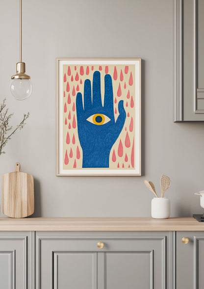 Mise en situation de l'affiche murale représentant une main bleue, sur un mur blanc dans une cuisine.
