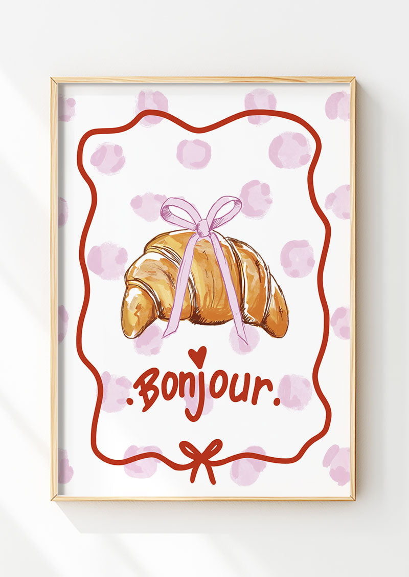 Affiche cuisine d'un croissant illustré avec noeud coquette, encadrée dans un cadre en bois