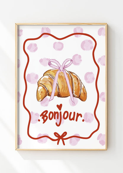 Affiche cuisine d'un croissant illustré avec noeud coquette, encadrée dans un cadre en bois