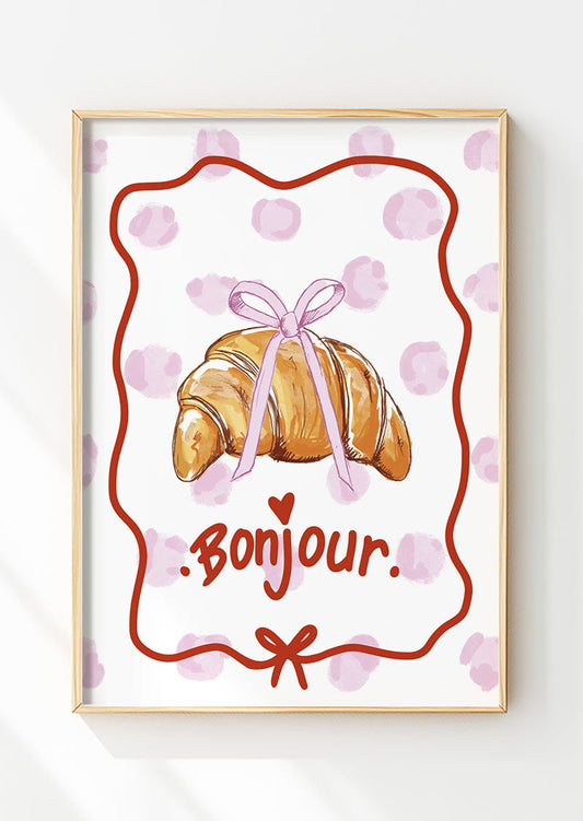 Affiche cuisine d'un croissant illustré avec noeud coquette, encadrée dans un cadre en bois