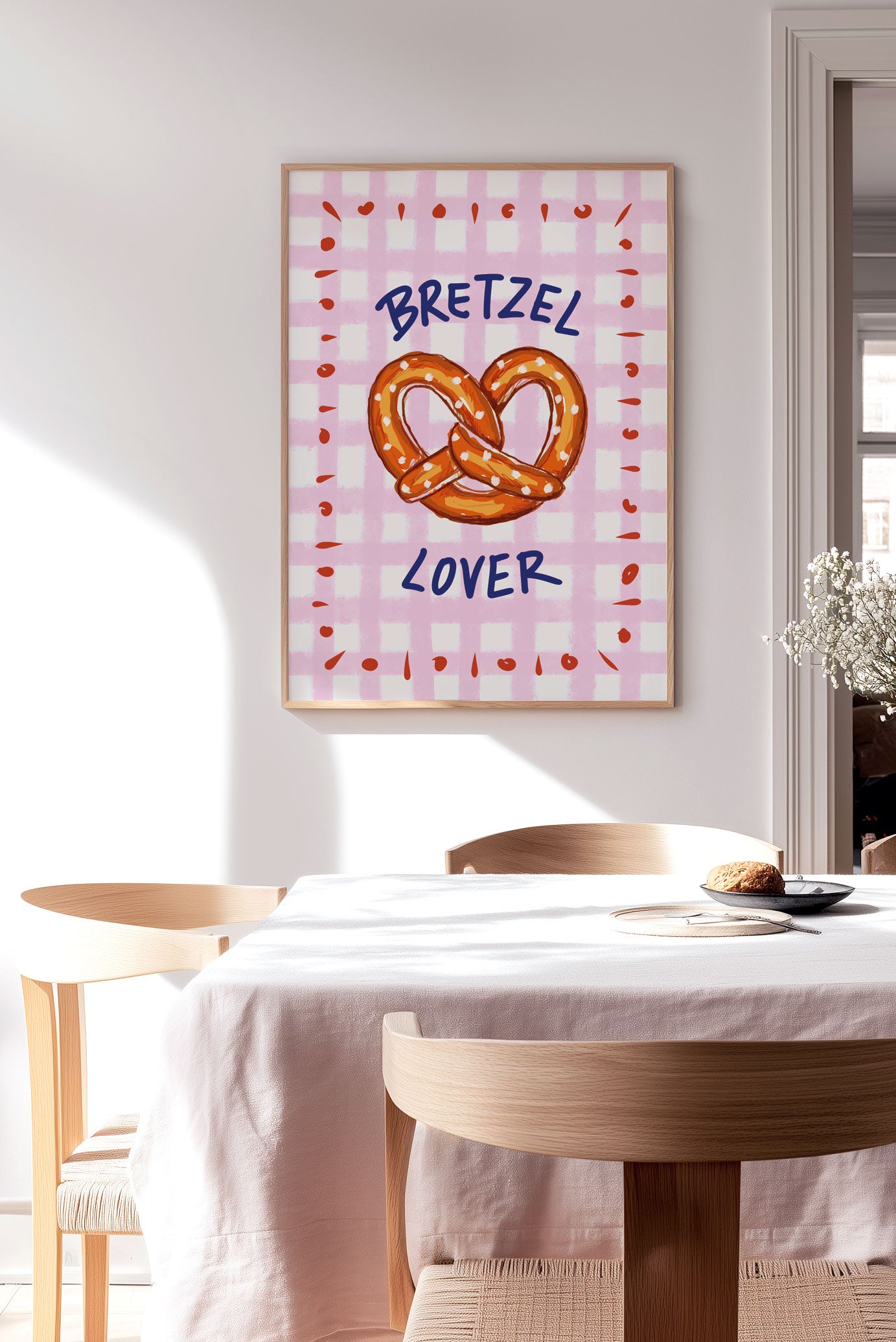 Affiche cuisine bretzel lover encadrée sur le mur d'une cuisine