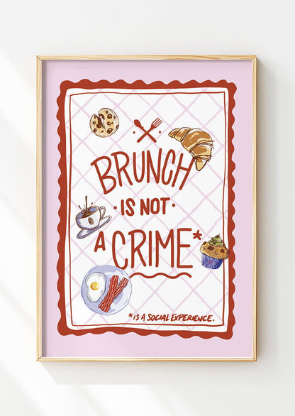 Affiche cuisine "brunch is not a crime" sur fond quadrillé et bordure rose dans un cadre en bois