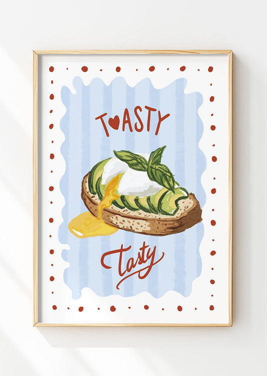 Affiche cuisine d'un toast à l'avocat et oeuf avec le texte "toasty tasty" dans un cadre en bois