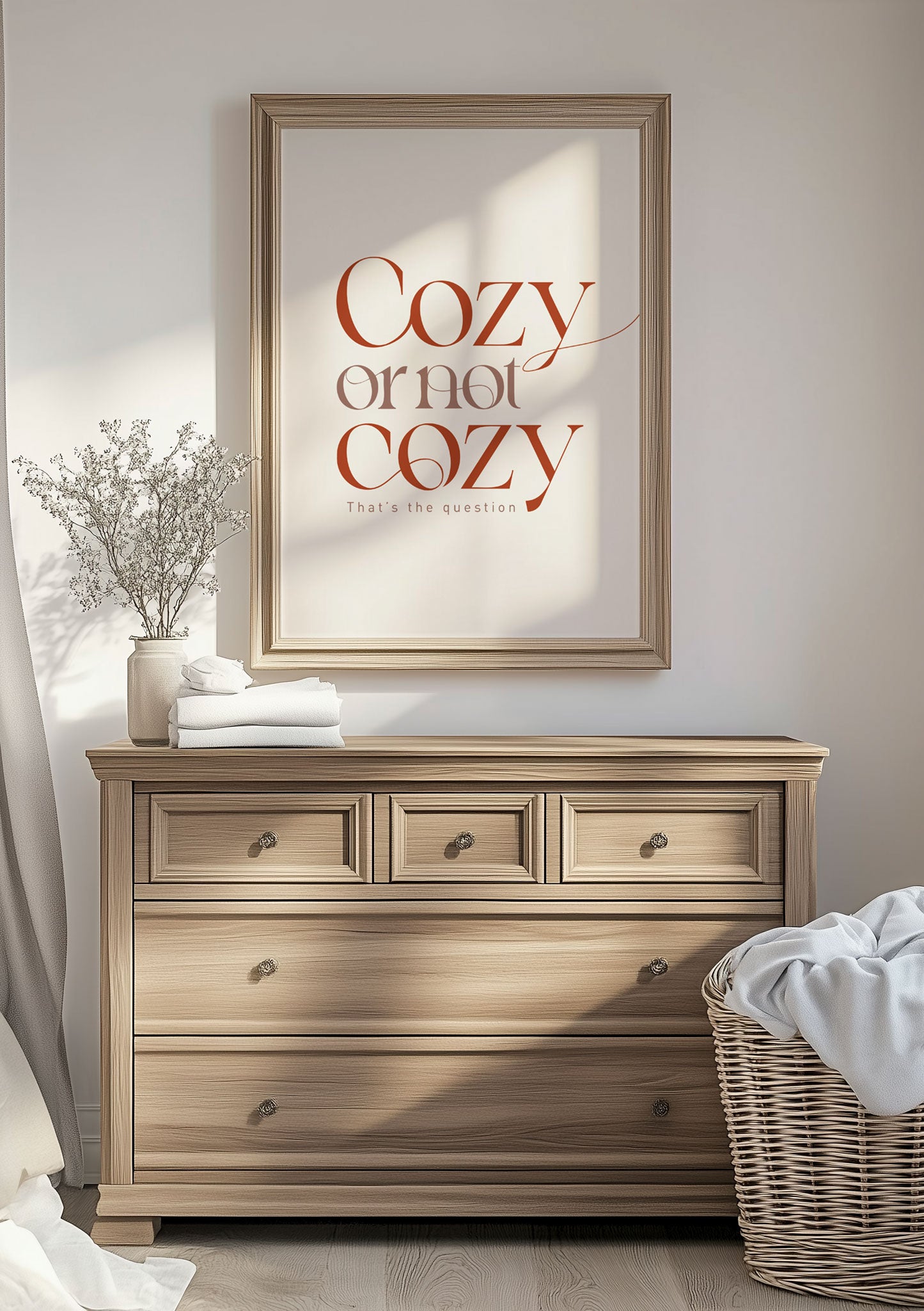 Affiche automne "cozy or not cozy" encadrée au dessus d'un meuble en bois