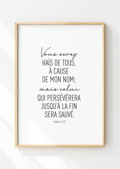 Affiche chrétienne du verset de la bible Matthieu 10:22 texte noir sur blanc dans un cadre en bois
