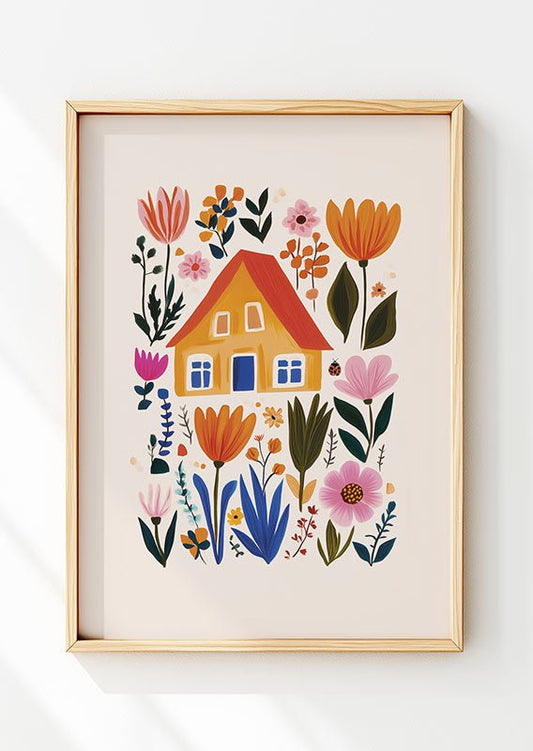 Affiche folk art dans un cadre en bois  avec un dessin d'une maison orange entourée de fleurs 