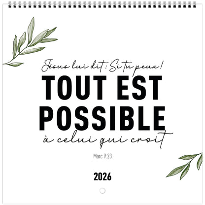 Gros plan de la couverture du calendrier, montrant un verset décoré de branche d'olivier