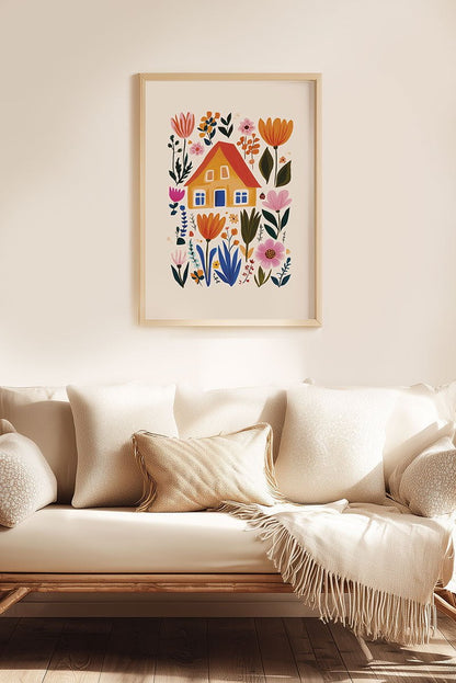 Affiche folk art d'un dessin d'une maison entourée de fleurs colorées encadrée dans un salon